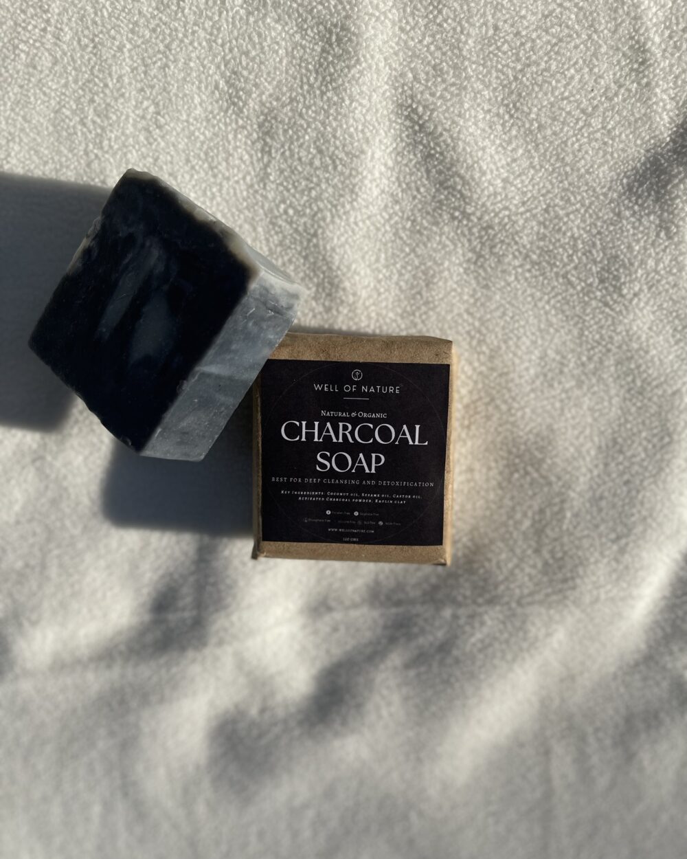 Well of Nature Organic Handmade Charcoal Soap – crafted with cold-pressed coconut oil, sesame oil, castor oil, and kaolin clay. A natural, deep-cleansing soap bar, perfect for detoxifying and nourishing the skin