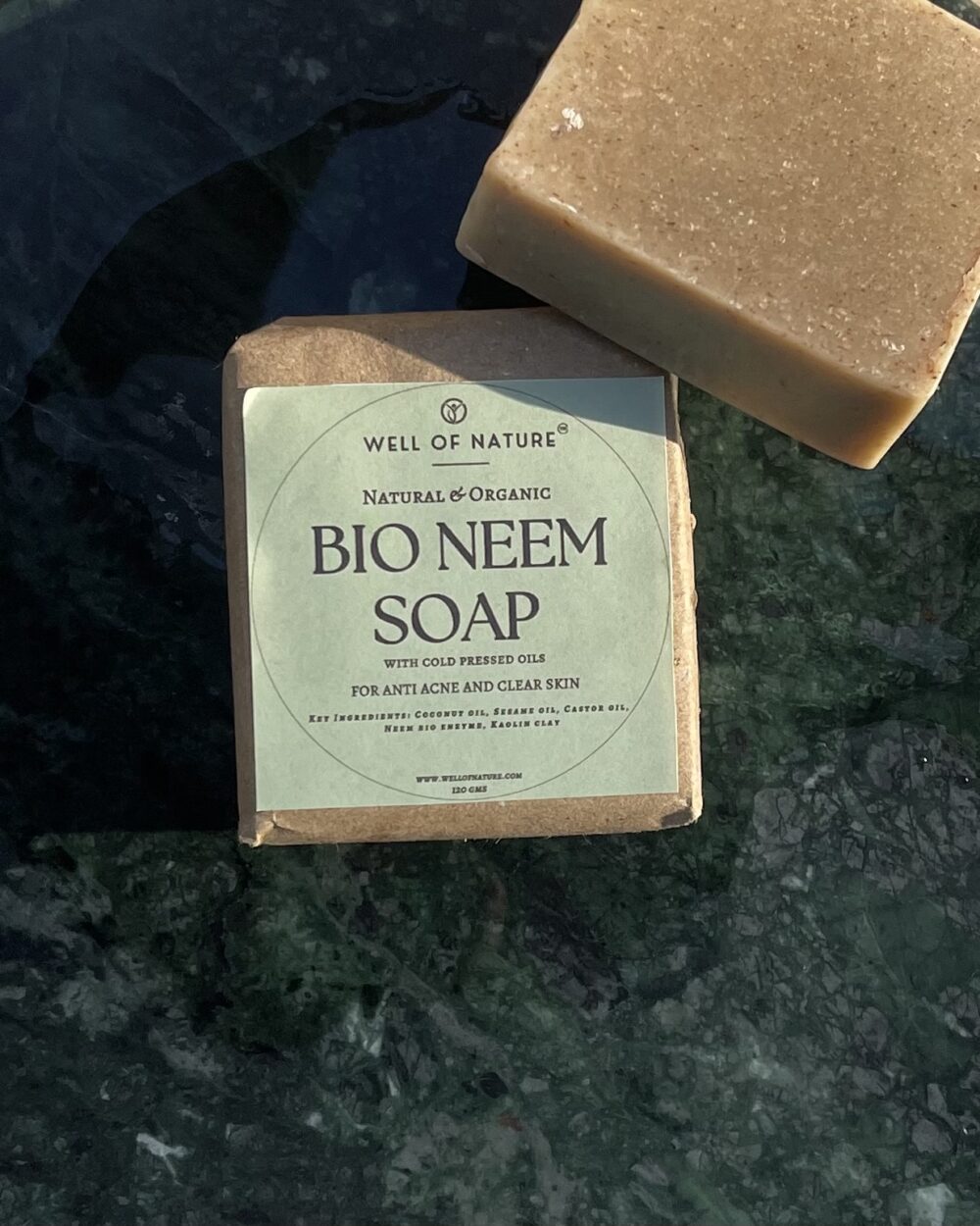 Well Of Nature Organic Bio Neem Soap bar – handmade with neem bio enzyme and sulphur-free cold-pressed coconut oil for natural acne treatment and skin purification.